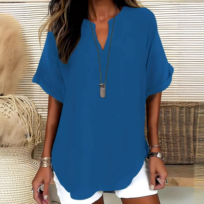 👚50% KORTING! 🔥Modieuze losse top met korte mouwen – V-hals met inkeping, asymmetrische zoom en lichtgewicht stof (5 kleuren, S–2XL) 🌸