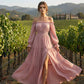 Damesjurk met hoge taille en blote schouders